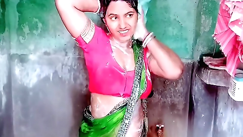 Indian naked girl shows her body on the grass outside