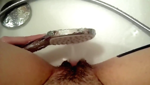 Hairy girl in white dress shows her pussy on porn movie