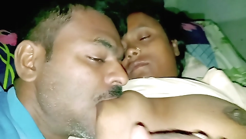 Indian brunette with small boobs fucks herself in bed