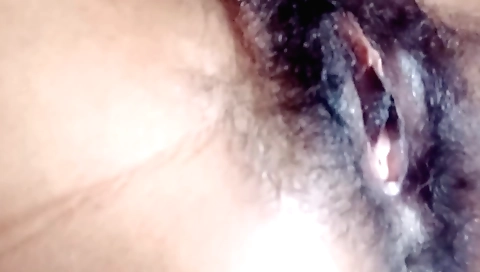 Indian amateur girl with hairy pussy fucks in solo