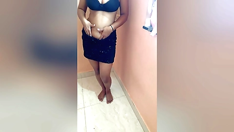 Brunette Indian girl is dancing on a song with a song (0)