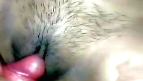 Indian teen with hairy bush and a tight round pussy