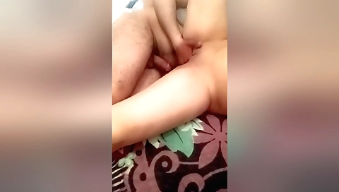 Hot chick in a sexy dress giving a blowjob on the webcam